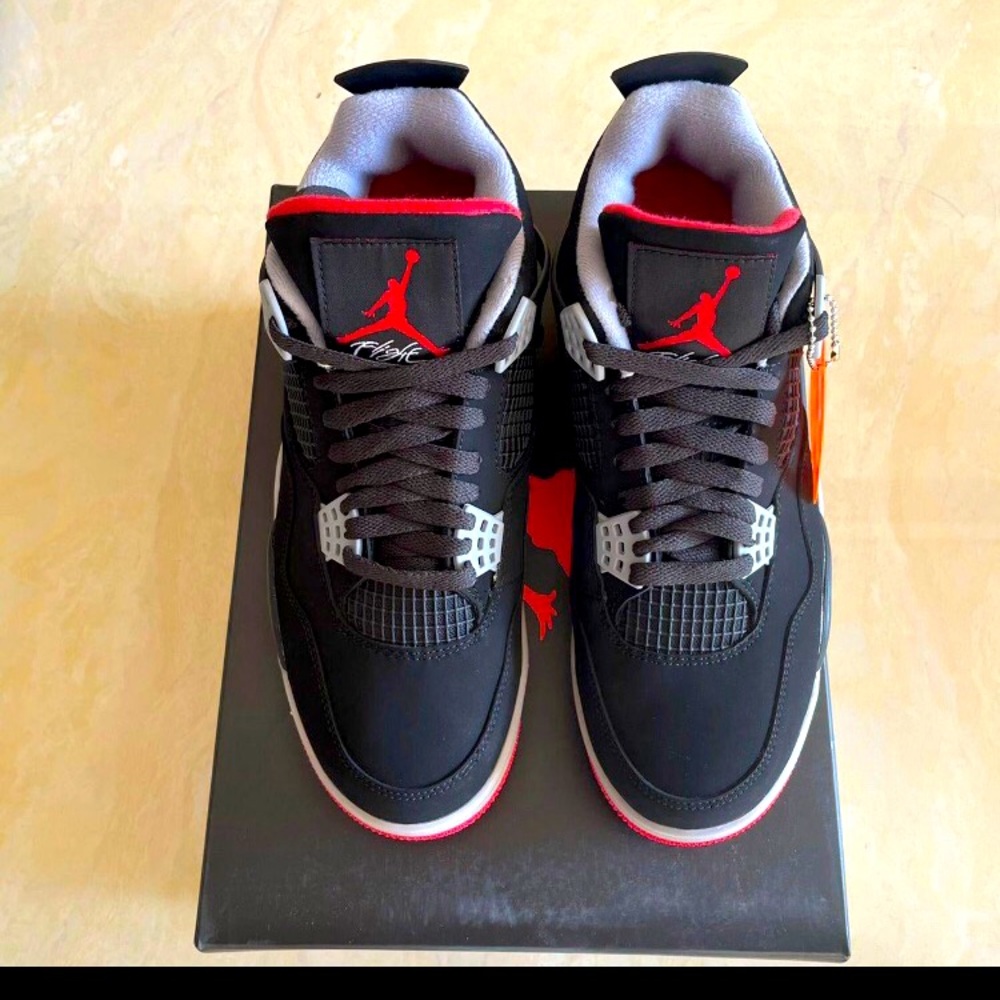 Black and red Jordan 4 bred retro size 11 brandnew